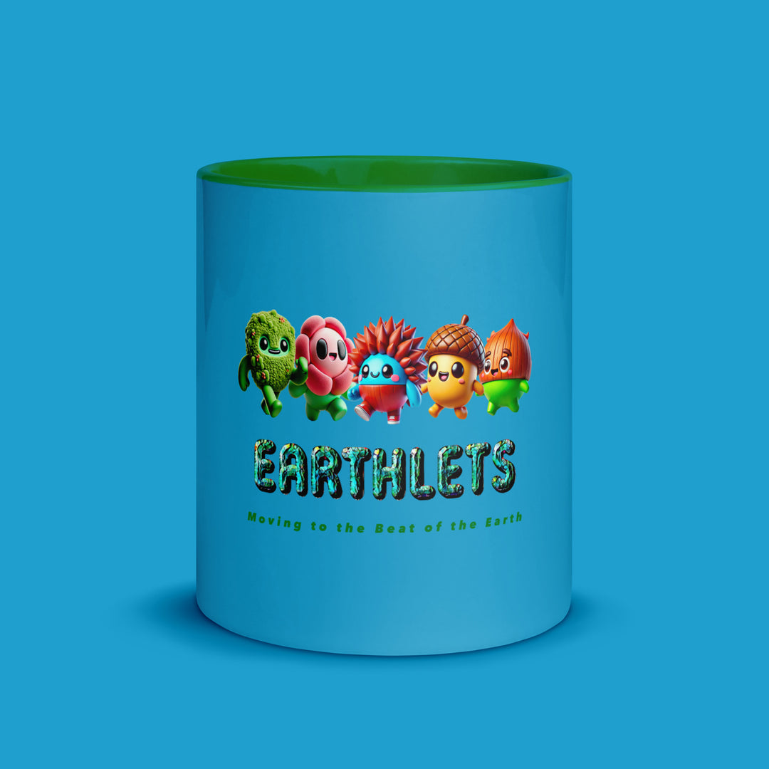 Colorful Earthlets mug on blue background, featuring fun character design and vibrant green interior.